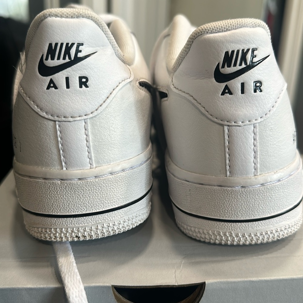 Nike Air Force 1 white with black swoosh. Size 6Y